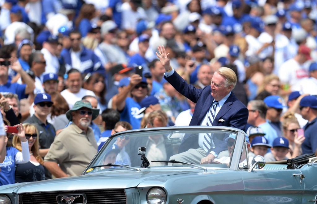 Dodger broadcaster Vin Scully waves to the fans during their home opener at Dodger Stadium Friday 4, 2014. The Giants beat the Dodgers 8-4.  (Photo by Hans Gutknecht/Los Angeles Daily News)