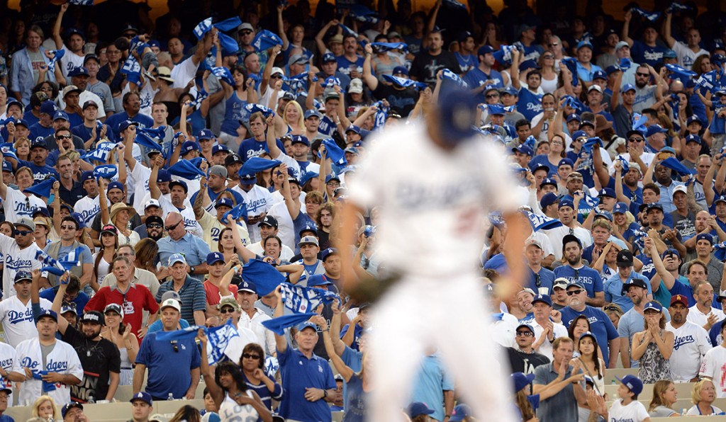Fans cheer on a struggling Clayton Kershaw in the 8th inning during Game 1 of  the National League Division Series, at Dodger Stadium Friday October 3, 2014. (Photo by Hans Gutknecht/Los Angeles Daily News)