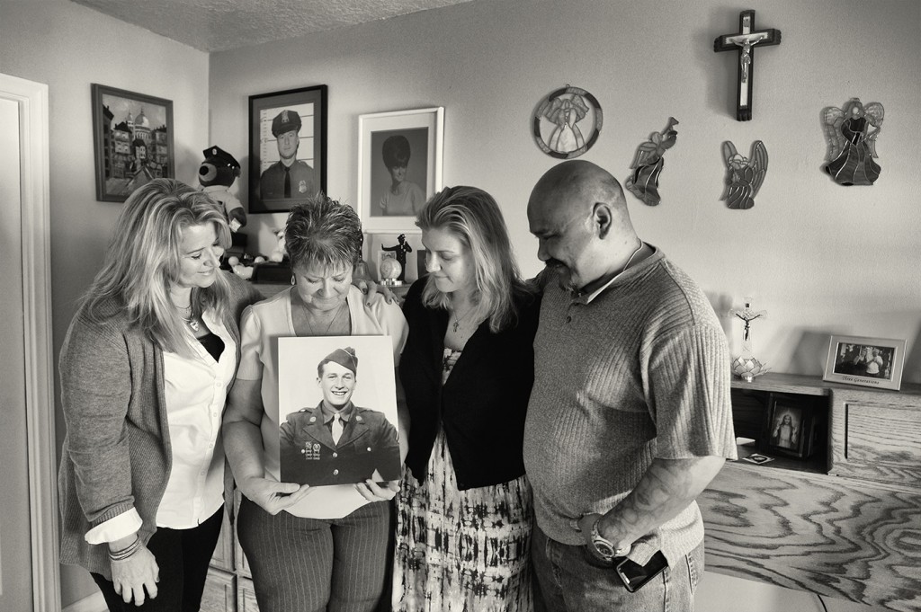 Clifford Rich’s daughter Laurie Amigo, wife Mary Rich, daughter Annette Bentley-Pintor and  and son in law Cyrus Pintor photo of WWII veteran Clifford Rich who passed away one day before his 91st birthday. Rich, a big Los Angeles Dodger fan received a phone call from former Dodgers manager Tommy Lasorda the day before he died. (Photo by Hans Gutknecht/Los Angeles Daily News)