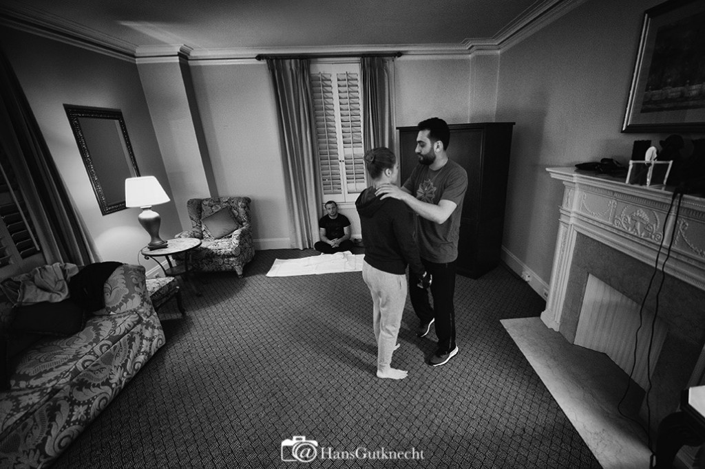 UFC women’s bantamweight champion Ronda Rousey works with coach Edmond Tarverdyan as coach Martin Berberyan looks on during a workout inside Rousey’s hotel room Thursday February 26, 2015. It was Rousey’s final workout before she defends her title against No. 1 contender Cat Zingano in the main event of UFC 184: ROUSEY vs. ZINGANO on Saturday, Feb. 28 at Staples Center in Los Angeles. (Photo by Hans Gutknecht/Los Angeles Daily News)