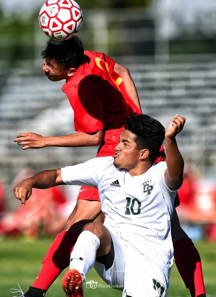 Canoga Park’s Ezequiel Quijada #10 and Austin Lee #2 battle for the ball during their Southern California Regional Division III boys soccer semifinal at Canoga Park High School in Canoga Park, CA, Thursday, March 12, 2015. Canoga Park defeated Cathedral Catholic 4-1 to advance to the final. (Photo by Hans Gutknecht/Los Angeles Daily News)