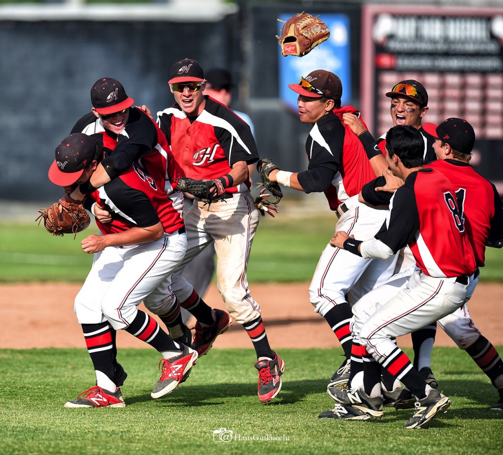 Hart pitcher Paul Richan #32 is mobbed by teammates after recording the final out during their  CIF Southern Section Division 1 quarterfinal baseball game against JSerra at Hart High School in Newhall, CA. Friday, May 29, 2015.  Hart beat JSerra 10-6 to advance. (Photo by Hans Gutknecht/Los Angeles Daily News)