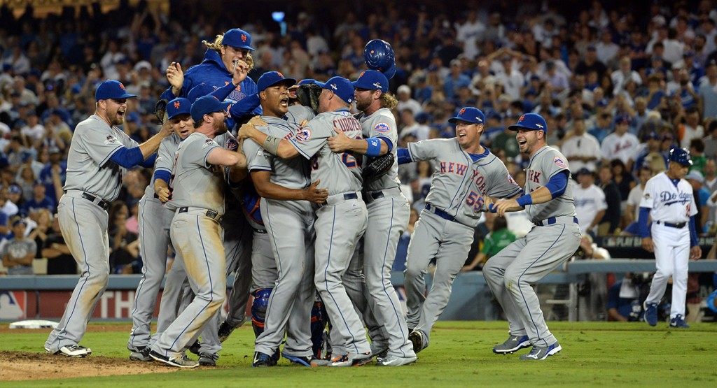 The Mets celebrate their victory over the Dodgers during game 5 of the NDLS at Dodger Stadium, Thursday, October 15, 1015. The Mets closed out the series by beating the Dodgers 3-2. (Photo by Hans Gutknecht/Los Angeles Daily News)