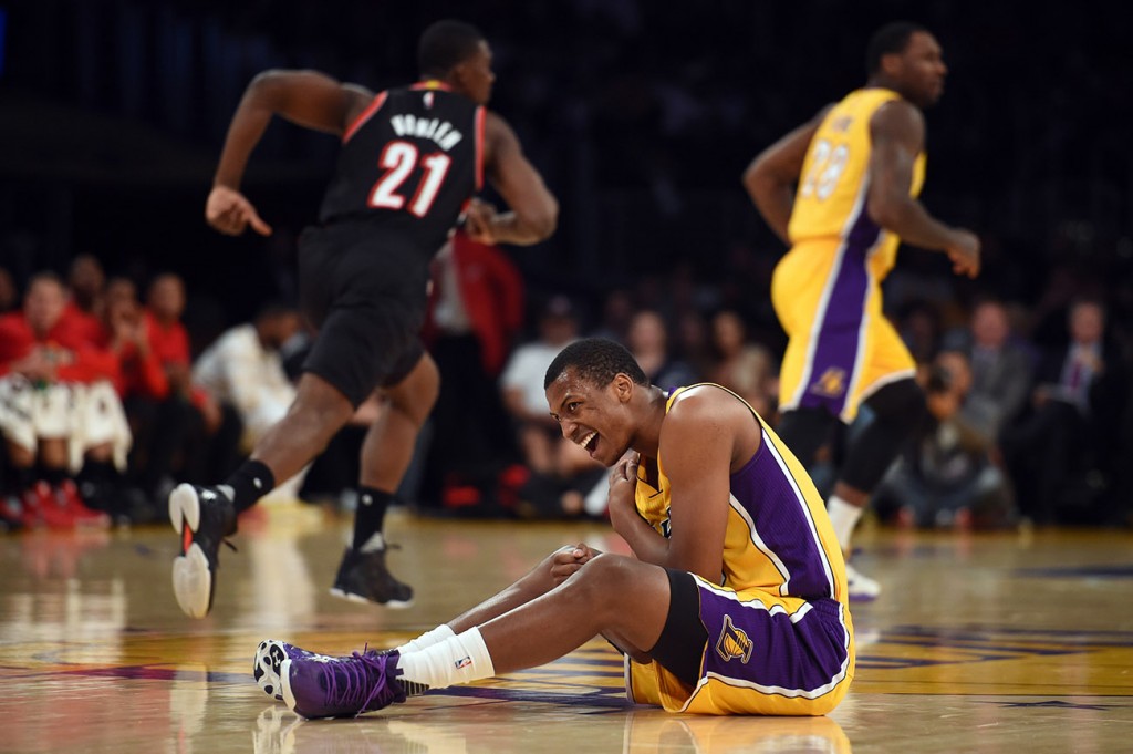 The Lakers’ Jonathan Holmes #10 sits on the court after injuring his shoulder in during their NBA preseason game against th eTrail Blazers at the Staples Center in Los Angeles, Monday, October 19, 2015.(Photo by Hans Gutknecht/Los Angeles Daily News)