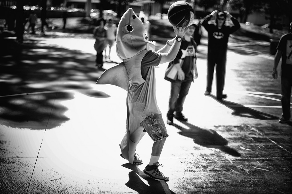 Mathew Hernandez, dressed as a shark, plays basketball at Old Orchard Park in Santa Clarita, Monday, October 26, 2015. Hernandez was at the park with Angel Wings Agency for their Harvest Day party. Angel Wings Agency is a community day program organization that teaches independent living skill to people with physical and mental disabilities. (Photo by Hans Gutknecht/Los Angeles Daily News)
