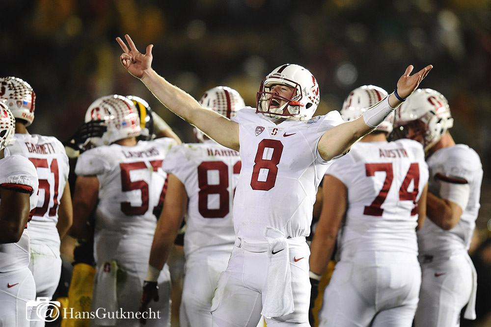 Stanford quarterback Kevin Hogan (8) raises his arms in victory as time expires during the 102nd Rose Bowl game in Pasadena, CA, Friday,January 1, 2016. Stanford defeated Iowa 45-16. (Photo by Hans Gutknecht/Los Angeles Daily News)