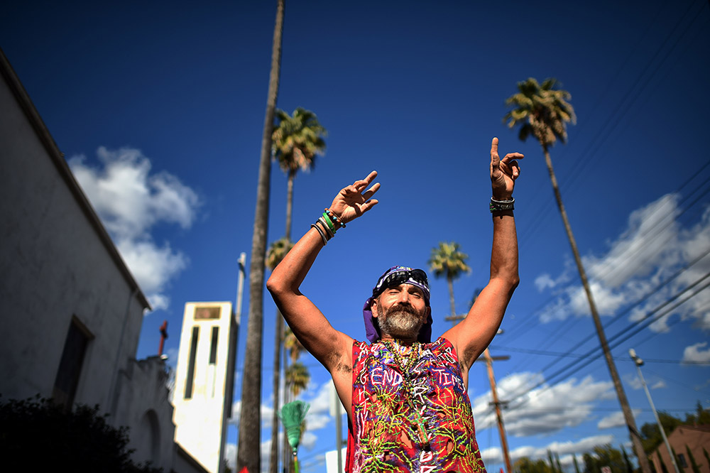 Daniel Brown, Simi Valley, dances during the Hope of the Valley Rescue Mission Thanksgiving Banquet and Street Fair in Van Nuys, Wednesday, November 25, 2015.  (Photo by Hans Gutknecht/Los Angeles Daily News)