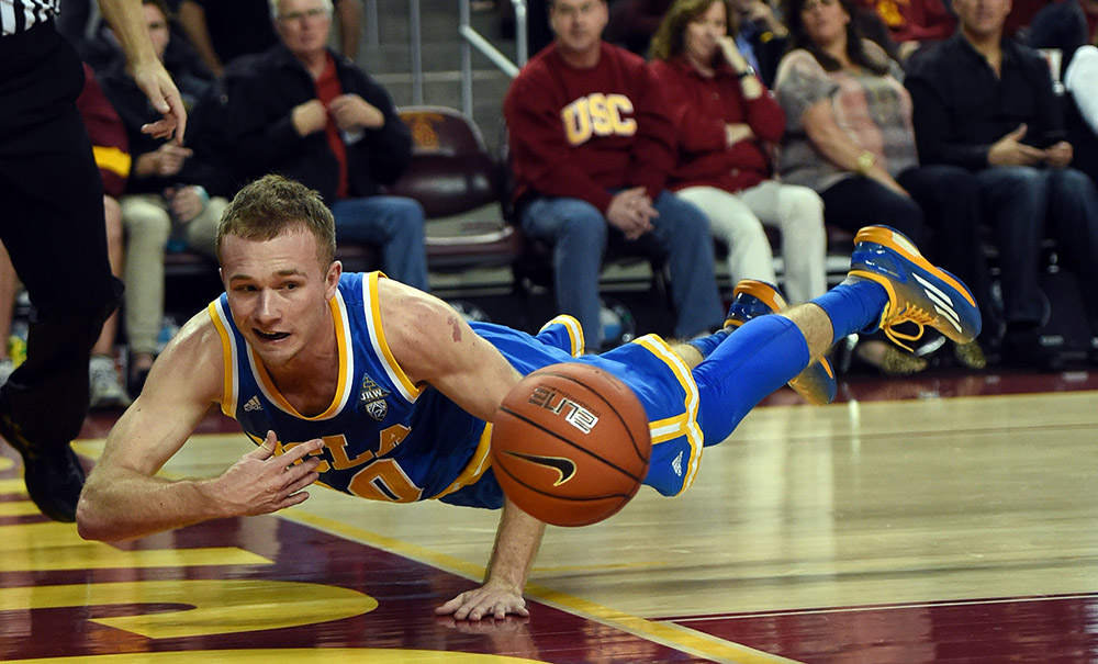 UCLA’s Bryce Alford #20 makes a diving attempt to keep the ball in play during their game against USC at the Galen Center in Los Angeles, February 4, 2016. USC beat UCLA 61-77. (Hans Gutknecht/Los Angeles Daily News)