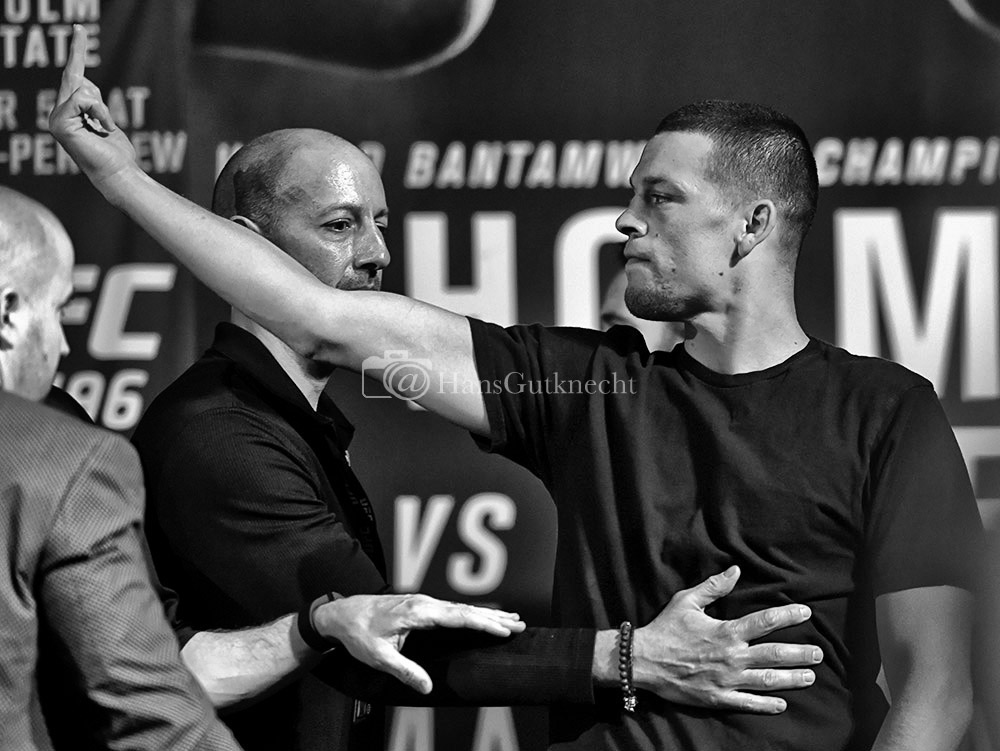 UFC featherweight champion Conor McGregor and Nate Diaz go after each other during a face-off during the UFC 196 press conference at the MGM Grand in Las Vegas, Thursday, March 3, 2016. (Photo by Hans Gutknecht/Los Angeles Daily News)
