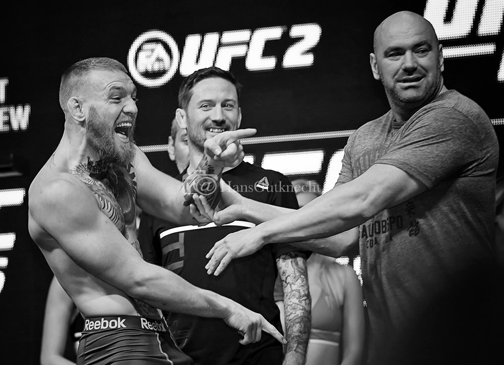 UFC President Dana White keeps UFC featherweight champion Conor McGregor away from Nate Diaz during the UFC 196 weigh-ins at the MGM Grand Garden Arena in Las Vegas, Friday, March 4, 2016. (Photo by Hans Gutknecht/Los Angeles Daily News)