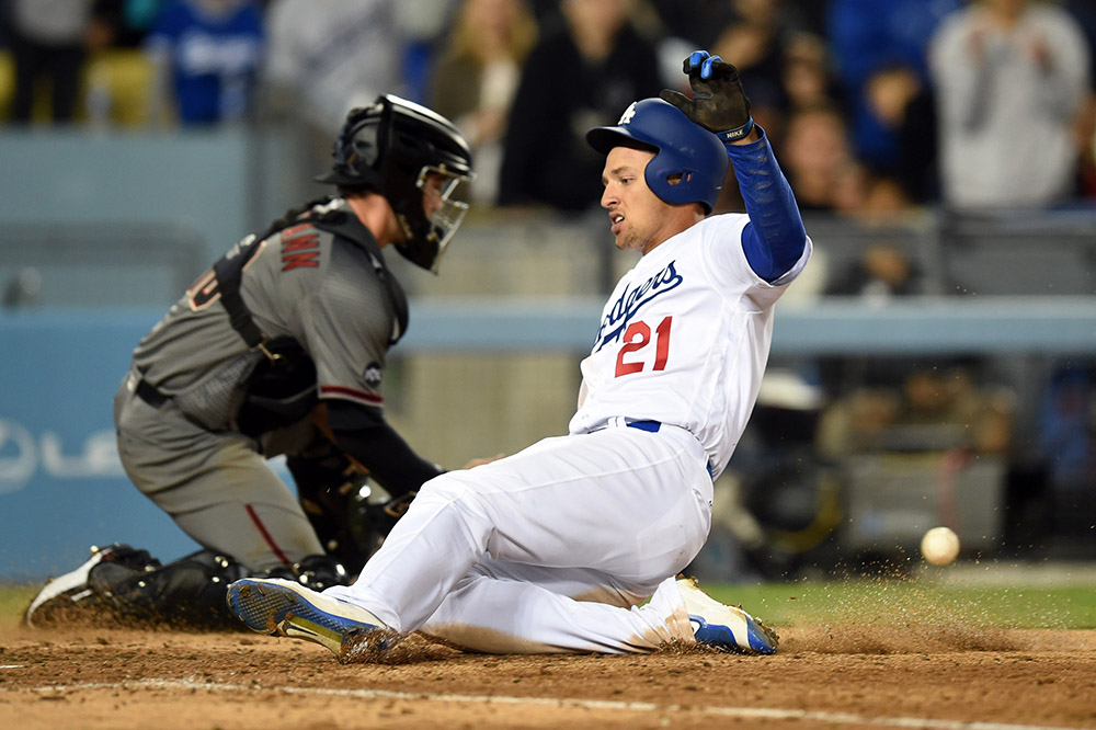 The Dodgers’ Trayce Thompson #21 beats the throw to Diamondbacks’ catcher Chris Herrmann #10 to score in the seventh inning during their MLB game at Dodger Stadium, Thursday, April 14, 2016. The Dodgers beat the Diamondbacks 5-2. (Photo by Hans Gutknecht/Los Angeles Daily News)