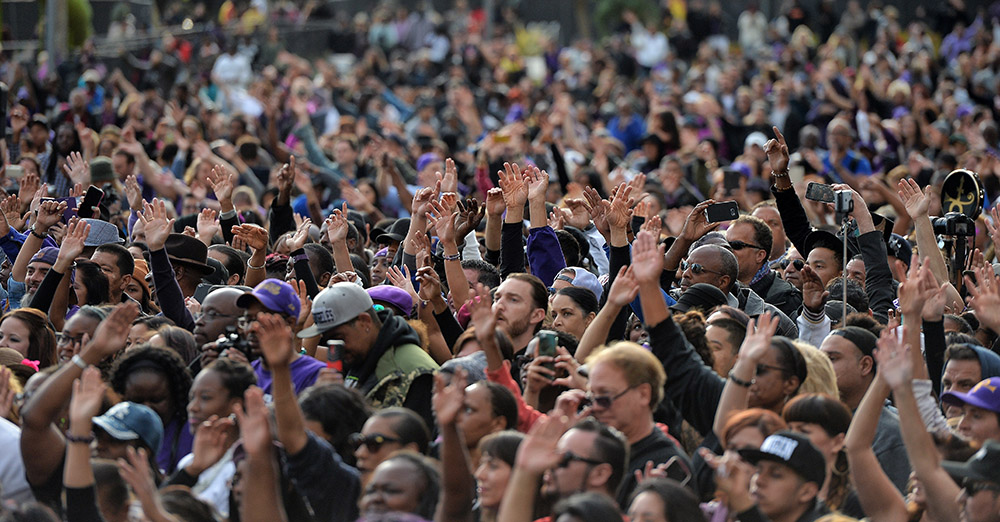 Fans during a Prince tribute concert outside Los Angeles City Hall, Friday, May 6, 2016. (Photo by Hans Gutknecht/Los Angeles Daily News)