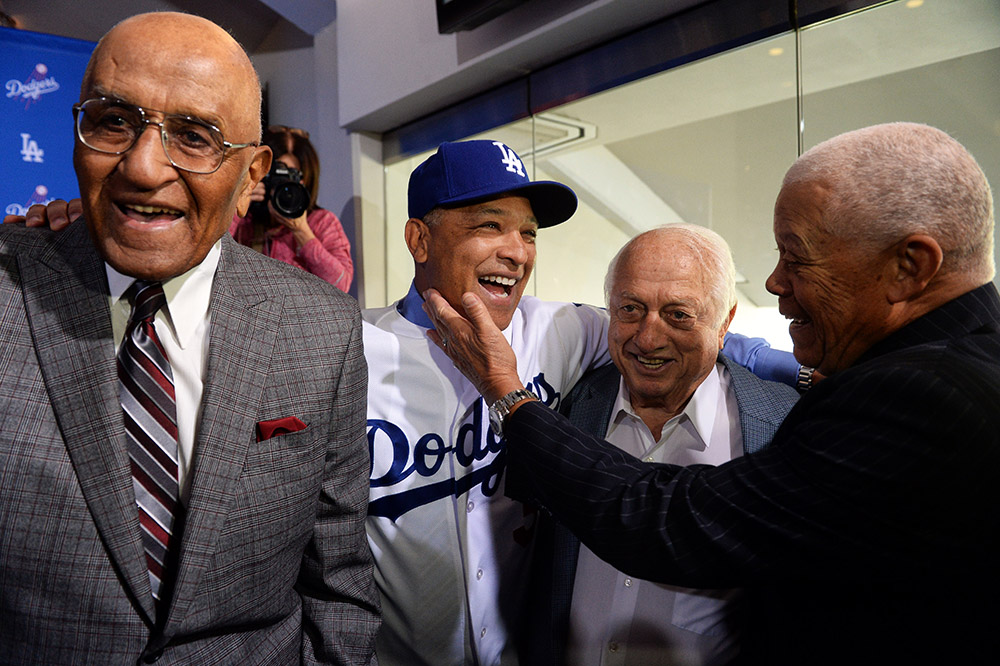 Dodger greats Don Newcombe, Tommy Lasorda and Maury Wills  congratulate Dave Roberts at Dodger Stadium, Tuesday, December 1, 2015. The Los Angeles Dodgers held a news conference Tuesday to introduce new manager Dave Roberts, who was announced as the 10th skipper in Los Angeles Dodger history. (Photo by Hans Gutknecht/Los Angeles Daily News)
