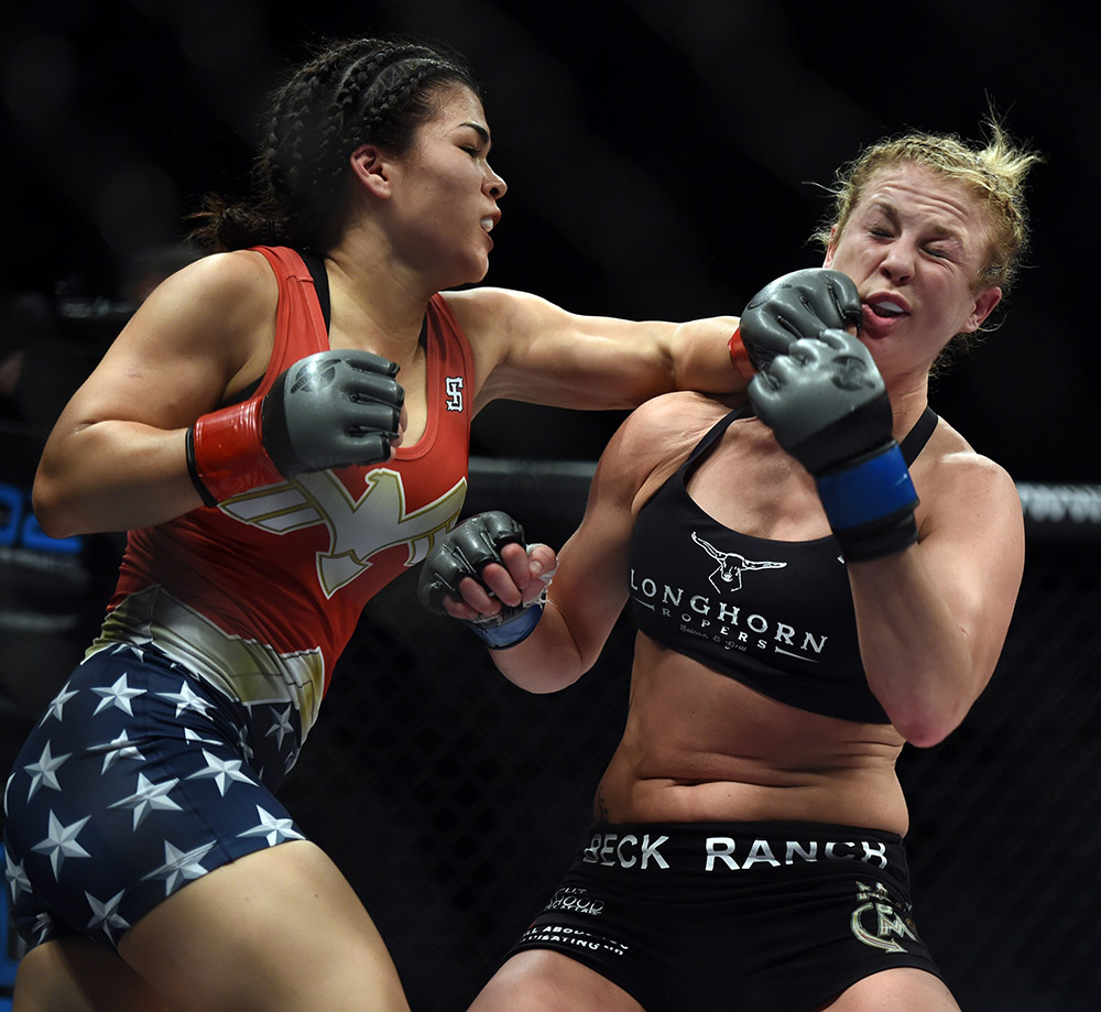 Rachael Ostovich (red) vs. Ariel Beck during Invicta FC 17 at the Hangar at OC Fair & Event Center in Costa Mesa, CA. Saturday, May 7, 2016. (Photo by Hans Gutknecht/Los Angeles Daily News)